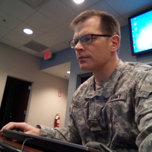 Major Scott Delius working in the National Guard operations center during an Atlanta snow storm this past winter.